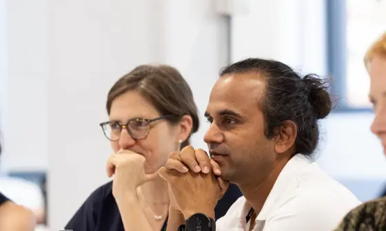 Four emsc alumni in classroom