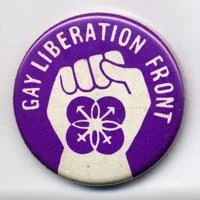 A purple badge with a fist on