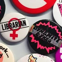 A close-up of a collection of badges