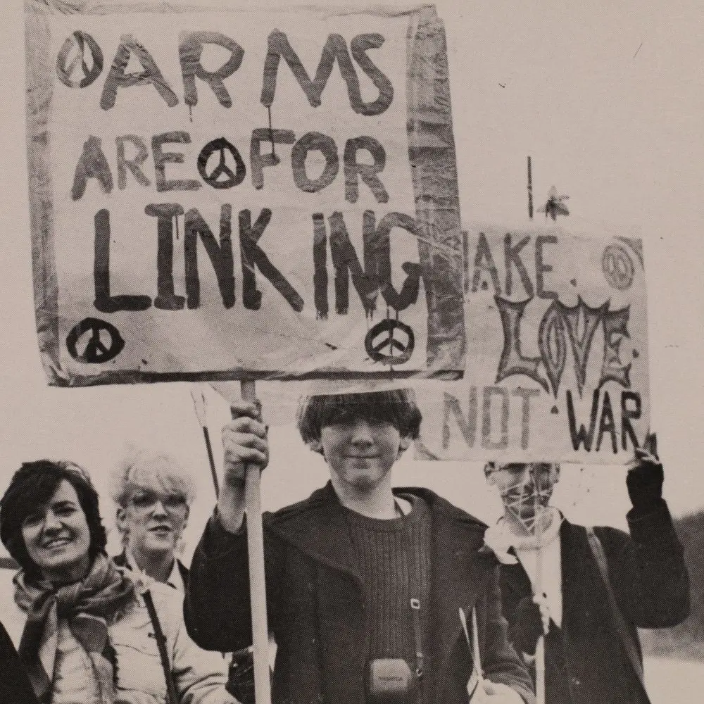 A group of people with placards protesting.