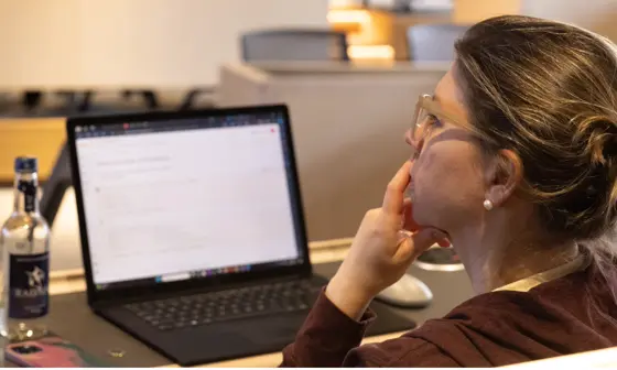 Student on laptop in classroom