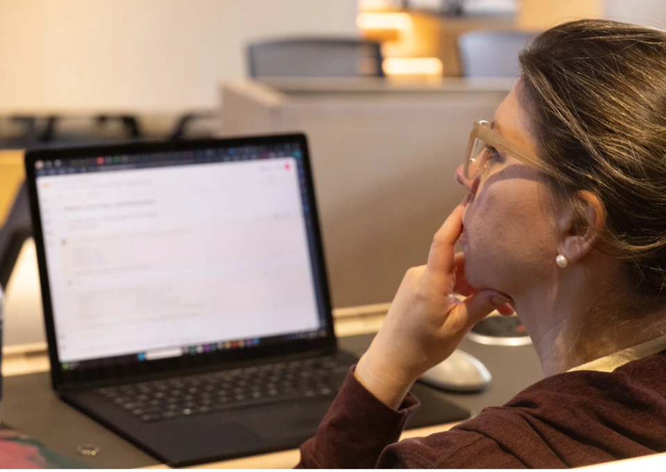 Student on laptop in classroom