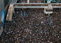 A bird-eye view of large crowd of protestors filling up streets of Hong Kong