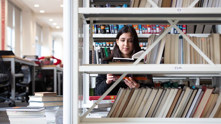 Female holding book - 16