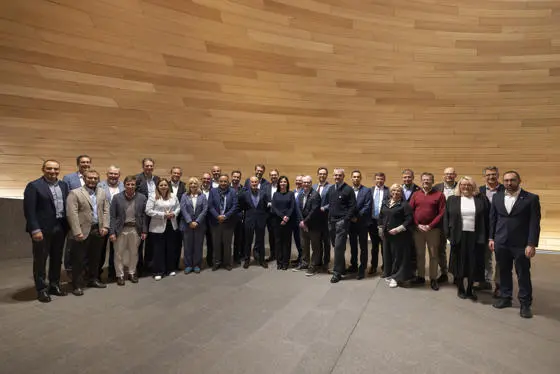 Group of mayors and city leaders from across Europe gather in a semi circle