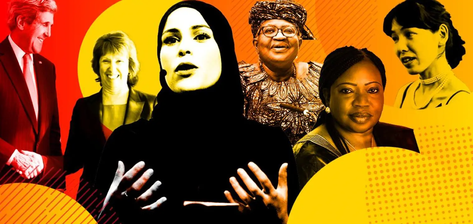 John Kerry with a collection of women diplomats