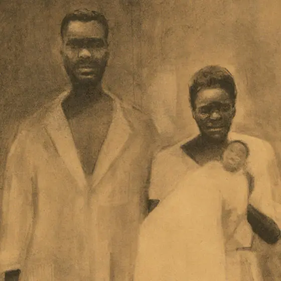 Two enslaved people holding a baby