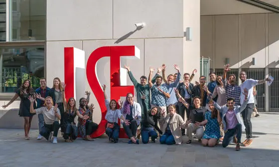 LSE students around giant LSE letters