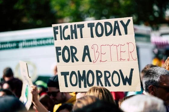 Fight today for a better tomorrow sign. By Pexels