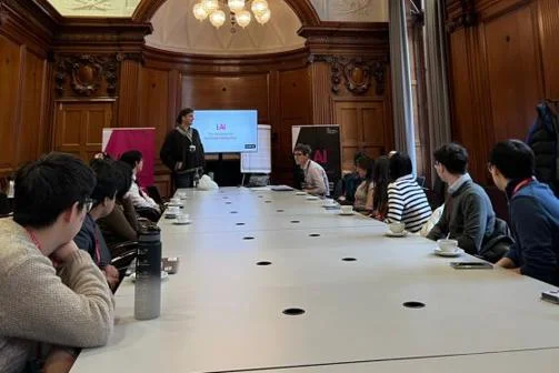 group of students look at presentation in Cabinet Office
