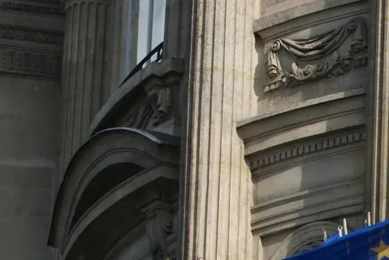 EU flags flying on a building