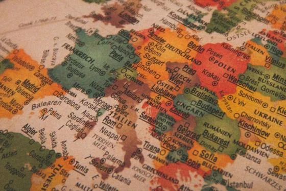 Vintage globe showing Europe (unsplash Christian Lue)