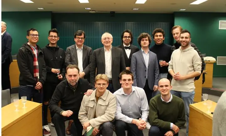 Group of students standing in seminar room