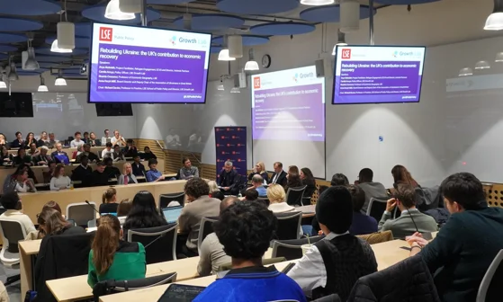 A panel of 5 people presenting to an audience in an LSE lecture theatre.