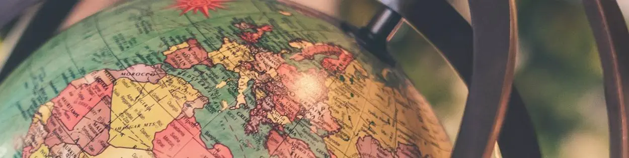 A globe map of Europe.