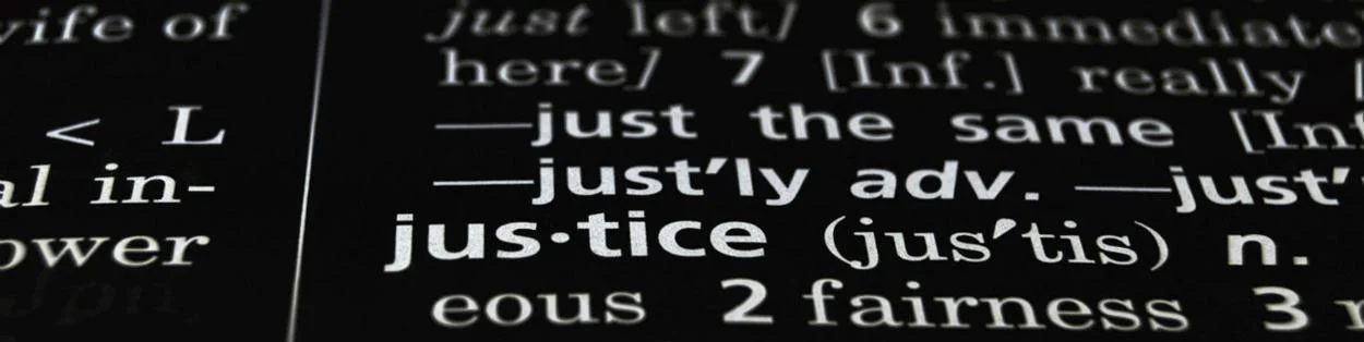 a dictionary showing the word 'justice'