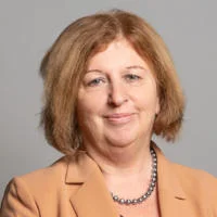 Photo of woman (Karen Buck) against grey background