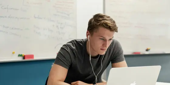 Male Student at laptop