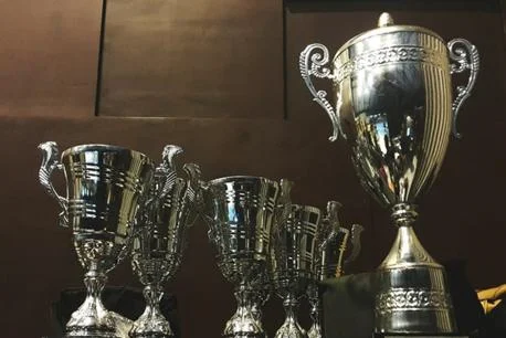 Row of silver trophies