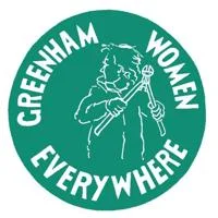 A green logo with Greenham Women Everywhere and a woman with bolt cutters on it.