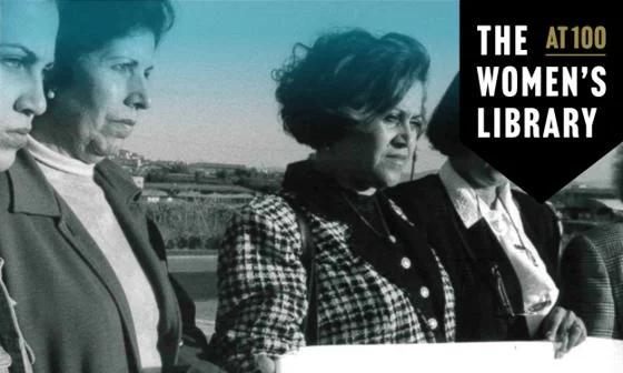 Women stood with solemn faces