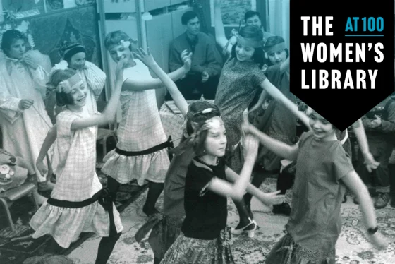 Youngsters dressed in costumes and dancing around a room