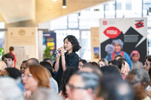 Audience member asks a question at an LSE public event in the Marshall Building on campus