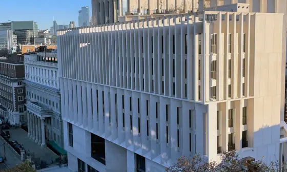Arial shot of a white modern building (the Marshall Building)