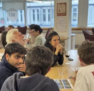 Alumni discussing quiz