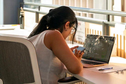 Student working on their laptop