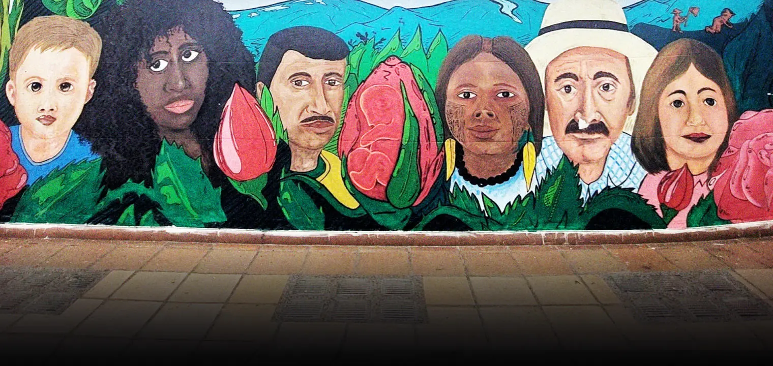 Mural from the office of COMUNES, political party of the former FARC guerrillas, in Medellin by George Kunnath