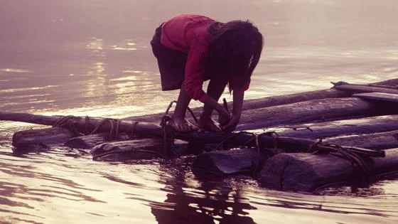 A Urarina girl on a raft