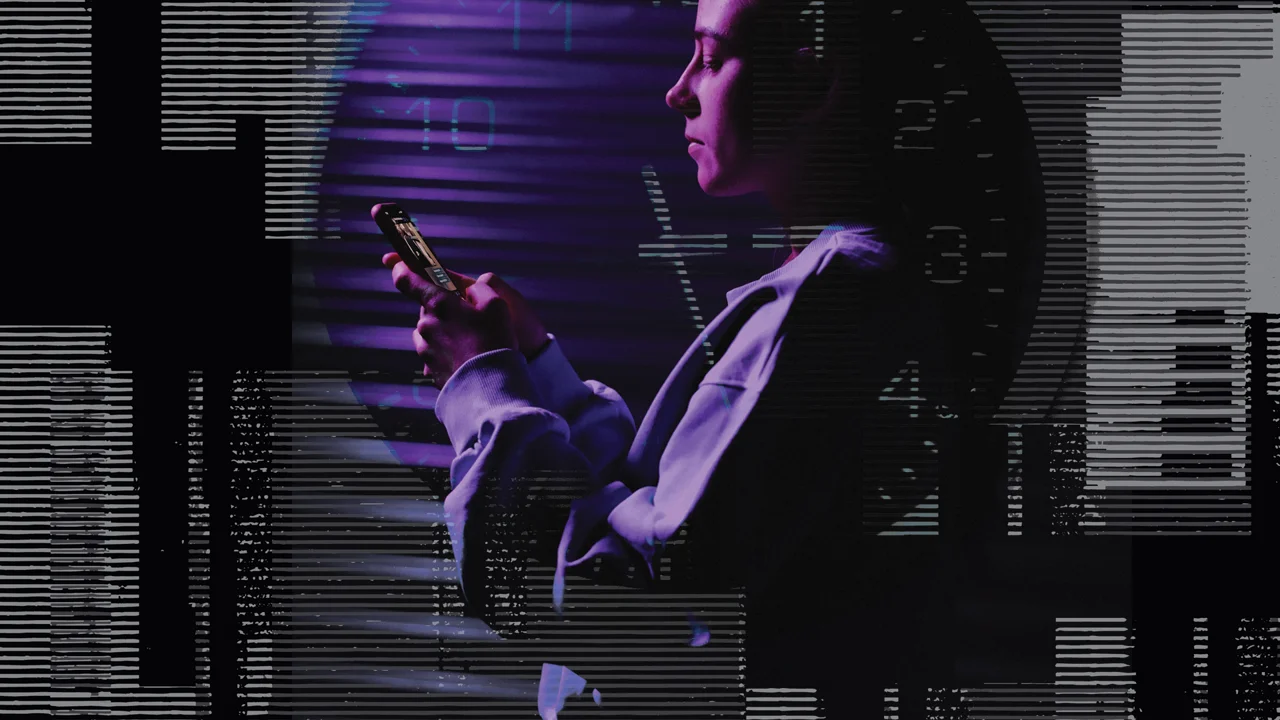 A woman holding a smartphone