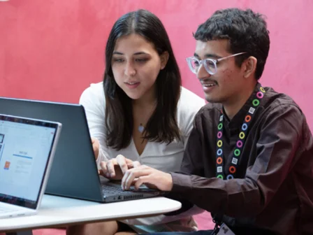 Students working together on a laptop