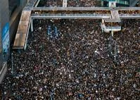 A bird-eye view of large crowd of protestors filling up streets of Hong Kong