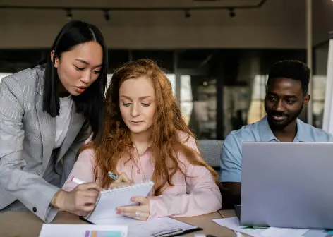 People offering support, looking through some notes
