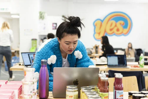 student at laptop in Genden