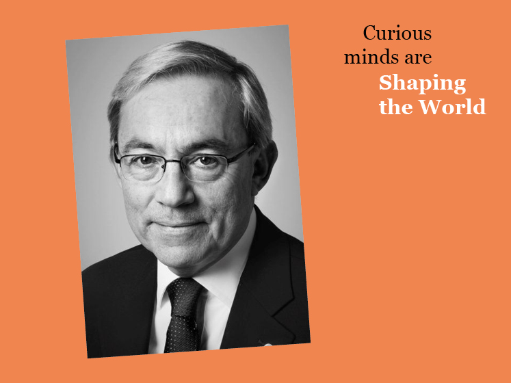 Orange graphic featuring a black and white image of Professor Sir Chris Pissarides with the text "Curious minds are shaping the world"