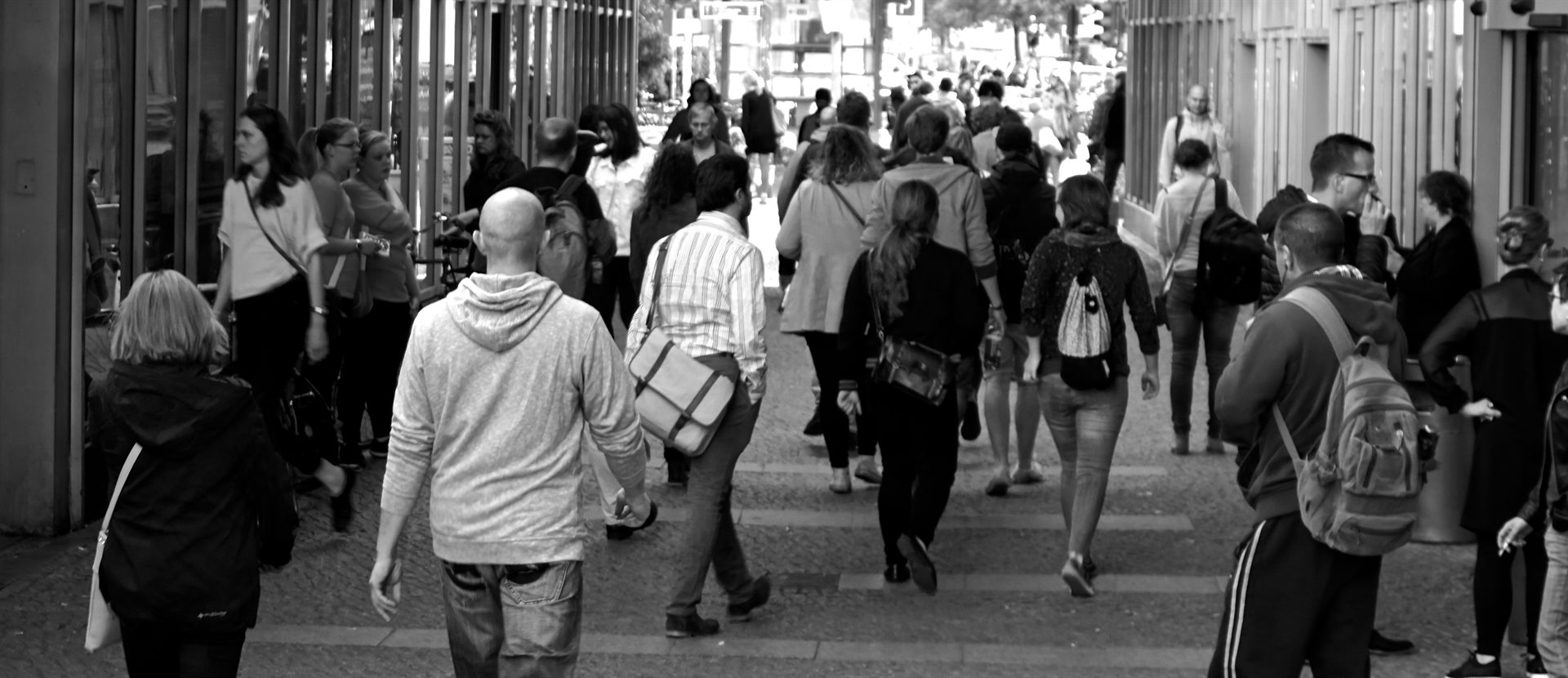 Photo by Ingo Joseph: https://www.pexels.com/photo/grayscale-photography-of-people-walking-near-buildings-9816/