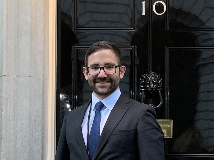 Joel standing outside the door of 10 Downing Street