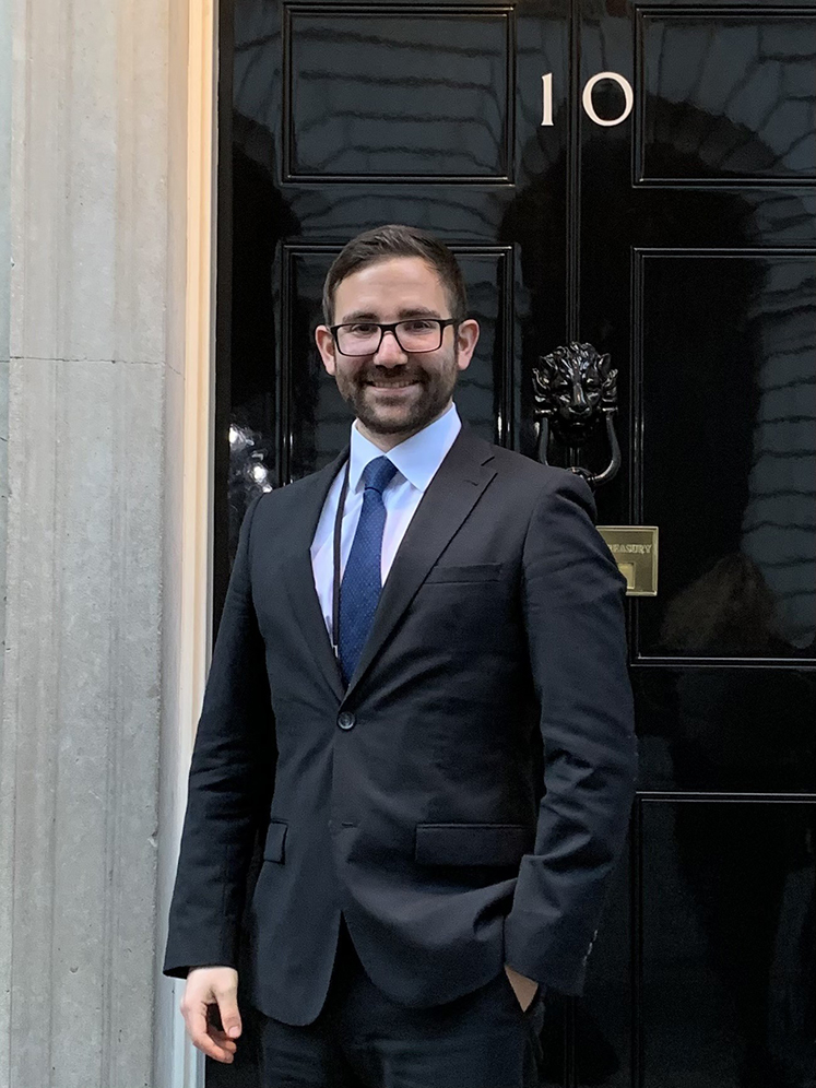 Joel standing outside the door of 10 Downing Street