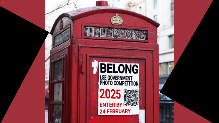 A London phone box with belong on it