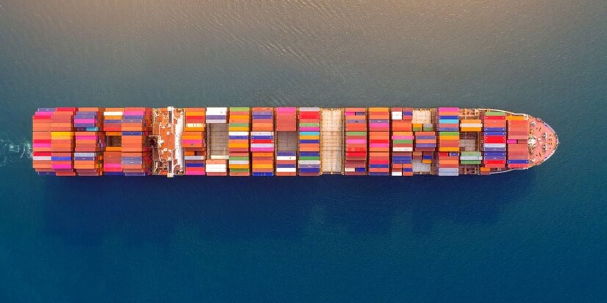 aerial-view-container-cargo-ship-sea_335224-740 (1)