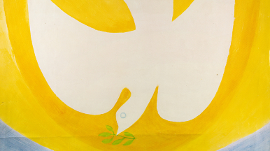 A white dove of peace on a yellow background