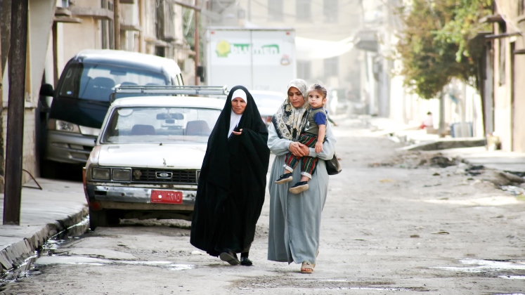 Women walking in Kirkuk. Photo: Serkan Senturk, Shuttertock.
